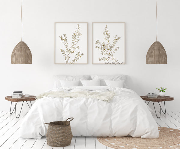 Bedroom with white bedding, wooden nightstands, and wall art in 2 wooden frames above bed .