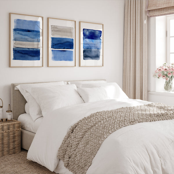 Bedroom with a bed, wall art, and window with curtains