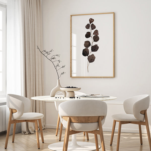 Slender brown eucalyptus print above a round dining table