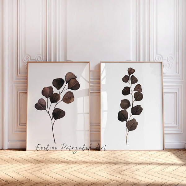 Brown eucalyptus wall art set of 2, chocolate brown watercolor prints leaning against a panelled wall