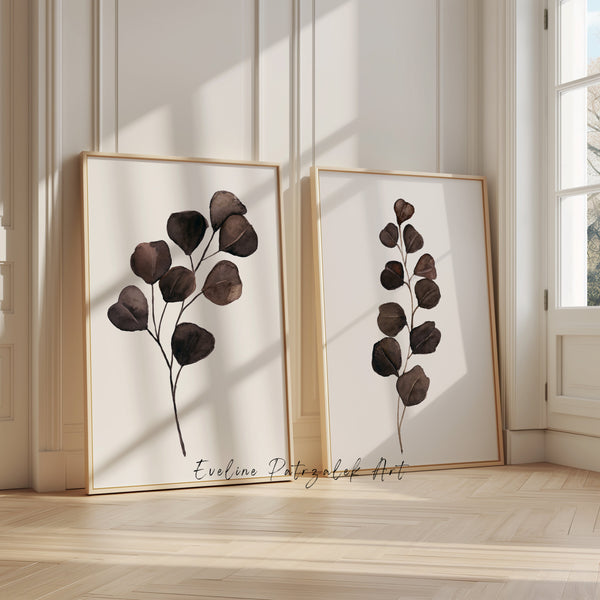 Chocolate brown eucalyptus prints leaning by a sunny window on an oak floor