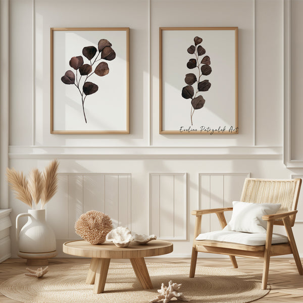 Brown eucalyptus wall art set of 2 on panelled wall with rattan chair and pampas grass