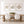 Dining room with wooden table and white chairs, featuring framed artwork of a starfish, coral, and fish in neutral colors.Pottery Barn like dinning room wall decor