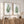 Green fern and palm leaf wall art set of 2, watercolor botanical prints above a rustic wooden sideboard
