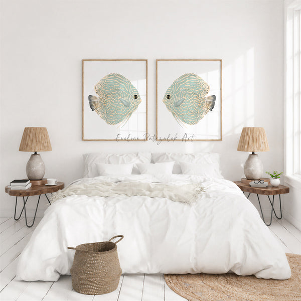Light green discus fish wall art set of 2 above a white bed between rattan lamps