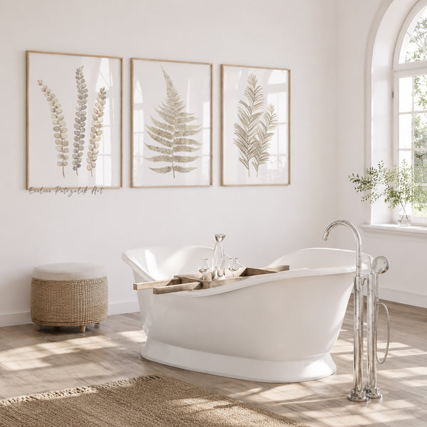 Bathroom with a freestanding bathtub, framed botanical prints, and natural light.