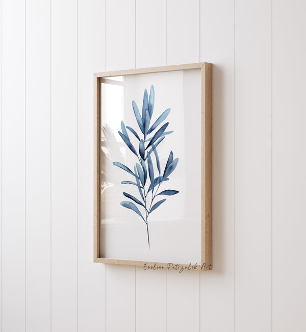 Navy blue long-leaf branch print in a light wood frame on a white panelled wall