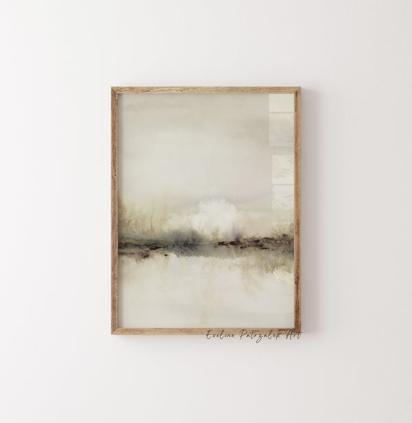 Abstract beige landscape print in a thin oak frame on a white wall