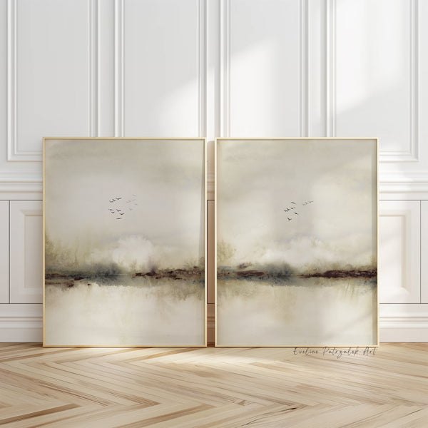 Neutral landscape wall art set of 2, beige watercolor prints with birds leaning against a white panelled wall