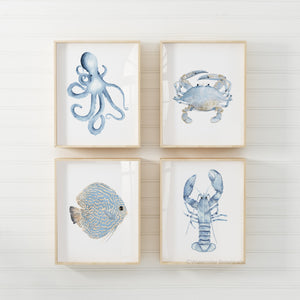 A framed watercolor painting showcases the intricate details of a blue and yellow fish, viewed from numerous angles.