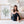 Artist Eveline Patrzalek with her sage green coral watercolor print