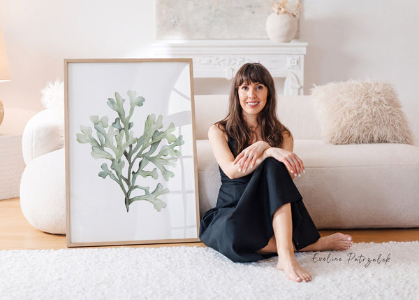 Artist Eveline Patrzalek with her sage green coral watercolor print