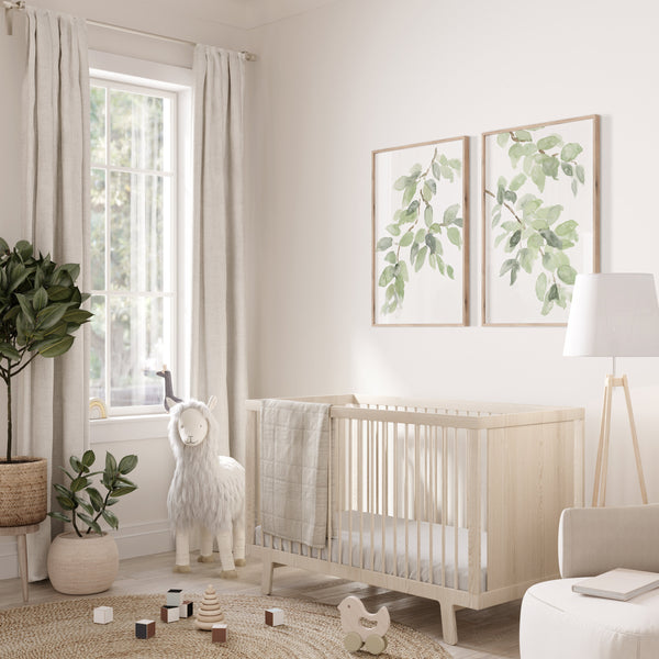 Sage green leaf prints set of 2 in a calm neutral nursery