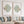 fish prints in sage green framed above sofa with 7 pillows