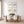 Beige coastal wall art set of 4 above a wooden dining table