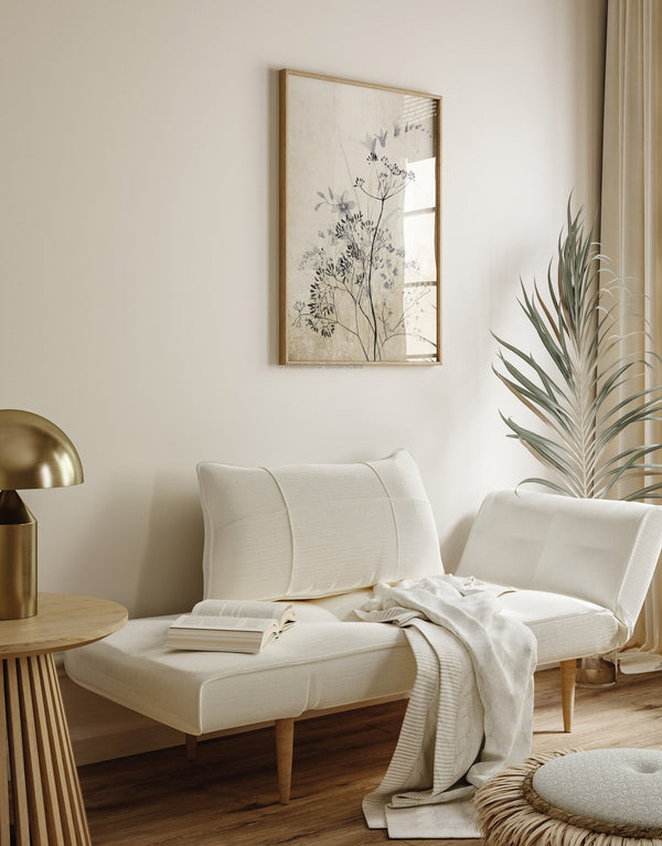 Black and beige wildflower print above a cream daybed