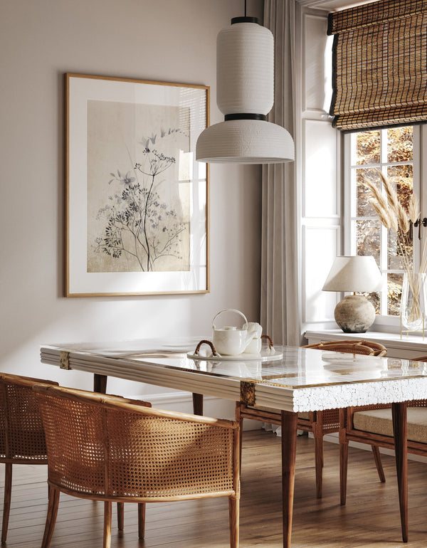 Wildflower print in a dining corner with cane chairs