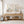 Farmhouse wall art with black wildflowers above an oak console table with baskets